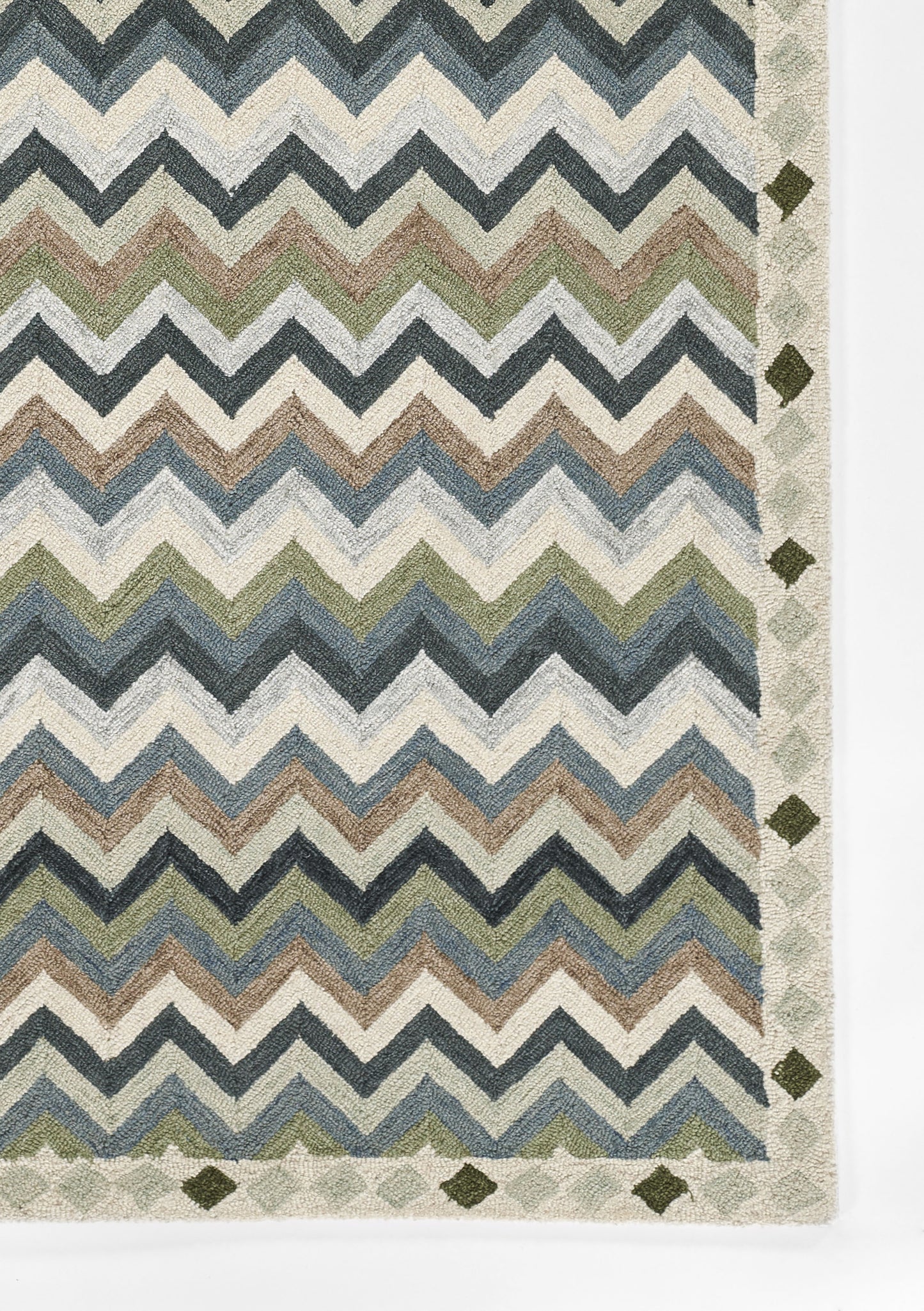 Multicolor chevron rug with blues, greens, taupe and cream; geometric border with diamond motifs, woven textile.
