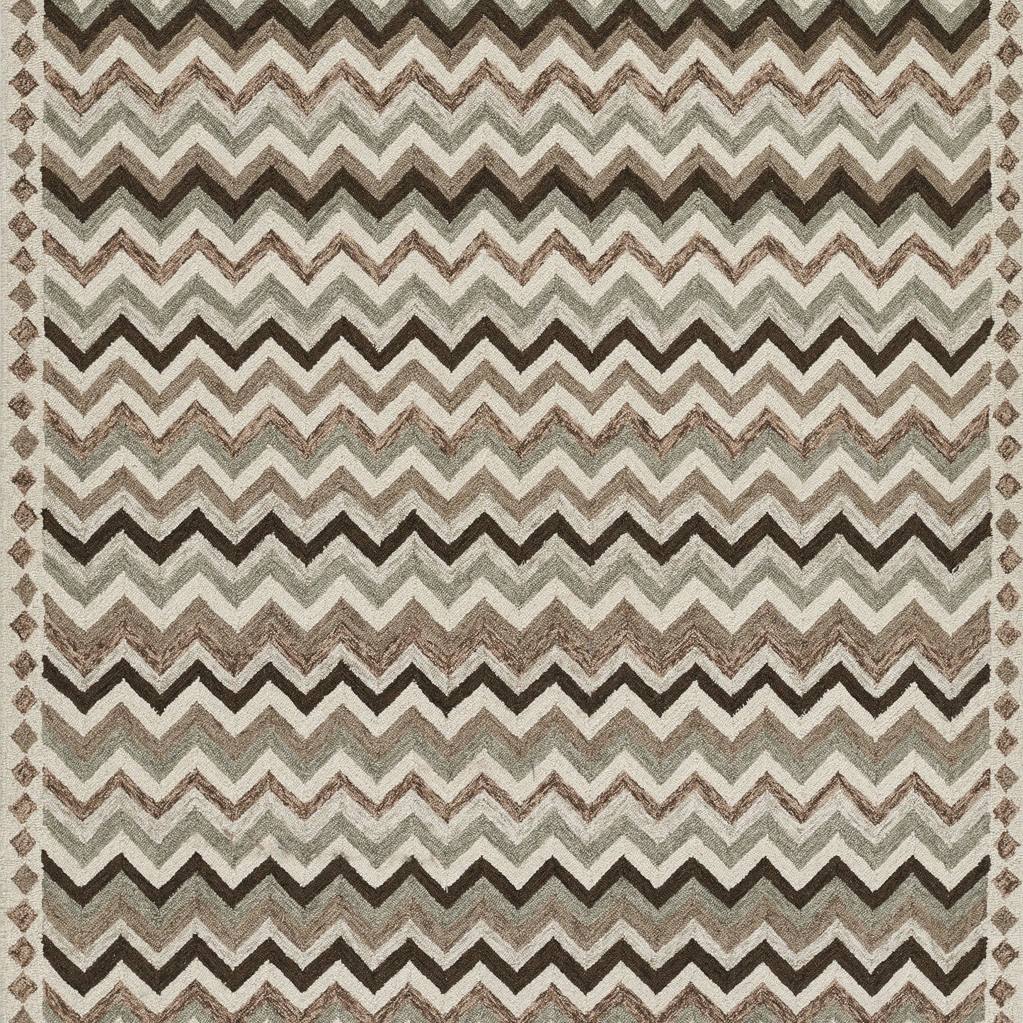 Chevron zigzag rug in earthy beige, brown, taupe and gray; rectangular, textured living room rug.