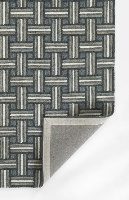 Blue-gray basketweave pattern faux wicker fabric; folded corner reveals gray backing.