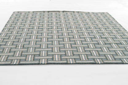Rectangular blue-gray geometric woven area rug with cream accents; modern basket weave.