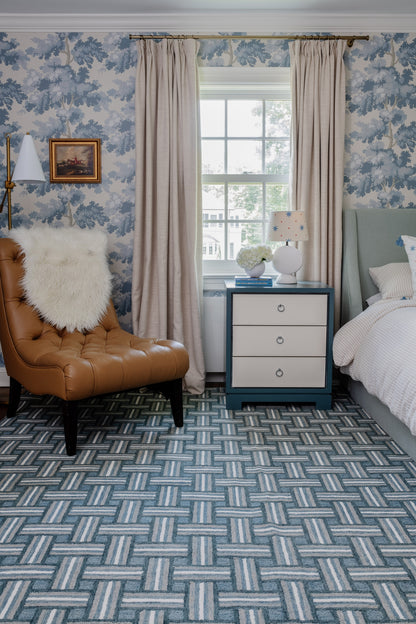 Blue basketweave rug runner (2'3" X 8') on the floor in a room.