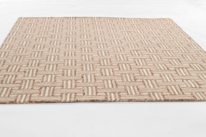 Beige textured flat-weave rug with a geometric grid of tan and cream rectangles.