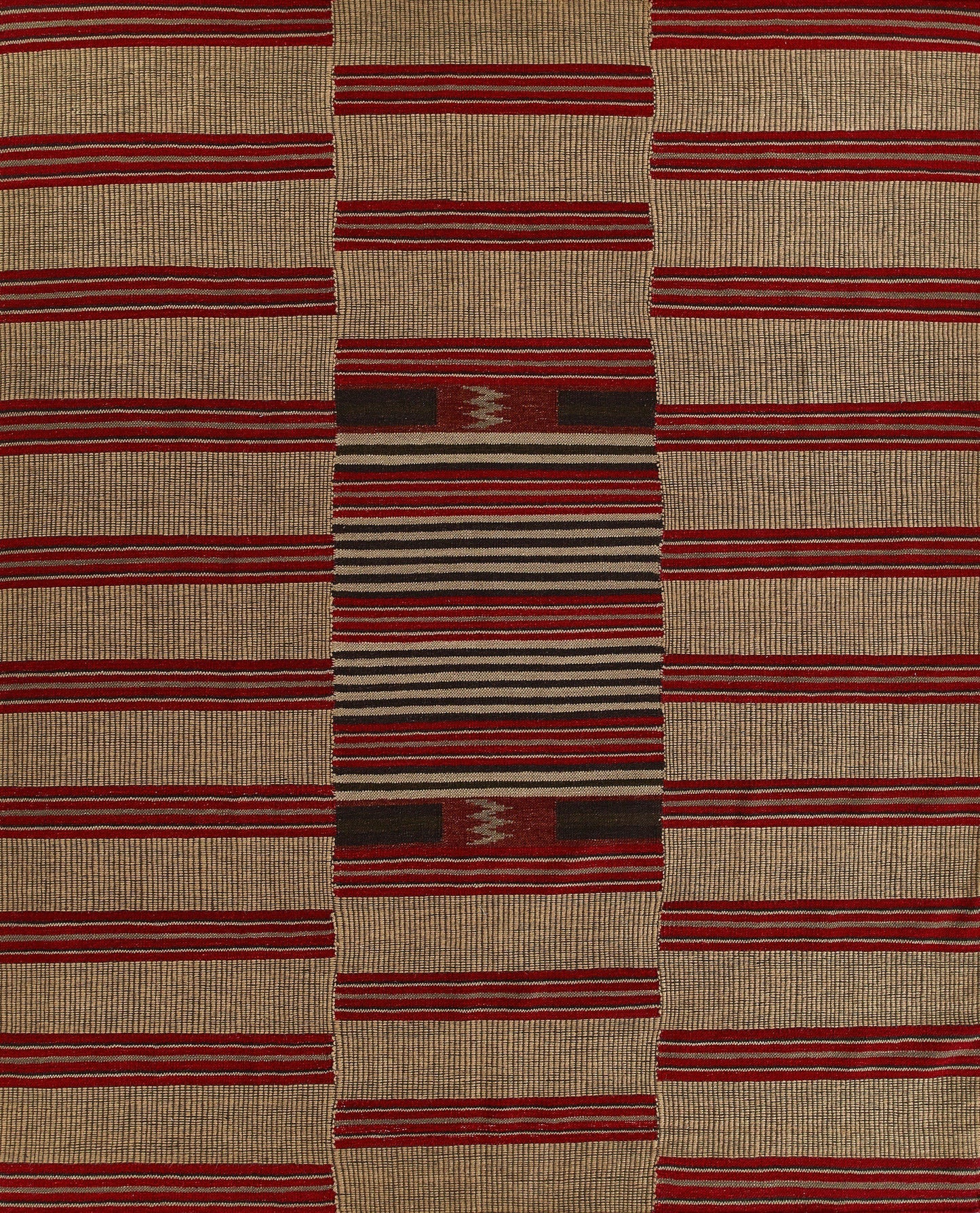 Flatwoven natural fiber rug with beige base and bold red stripes, featuring a central multicolor band.