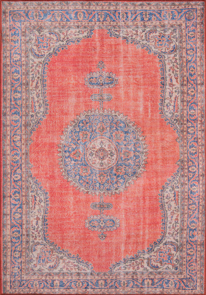 Persian-inspired rug: coral red field with blue central medallion, ivory/blue floral border.