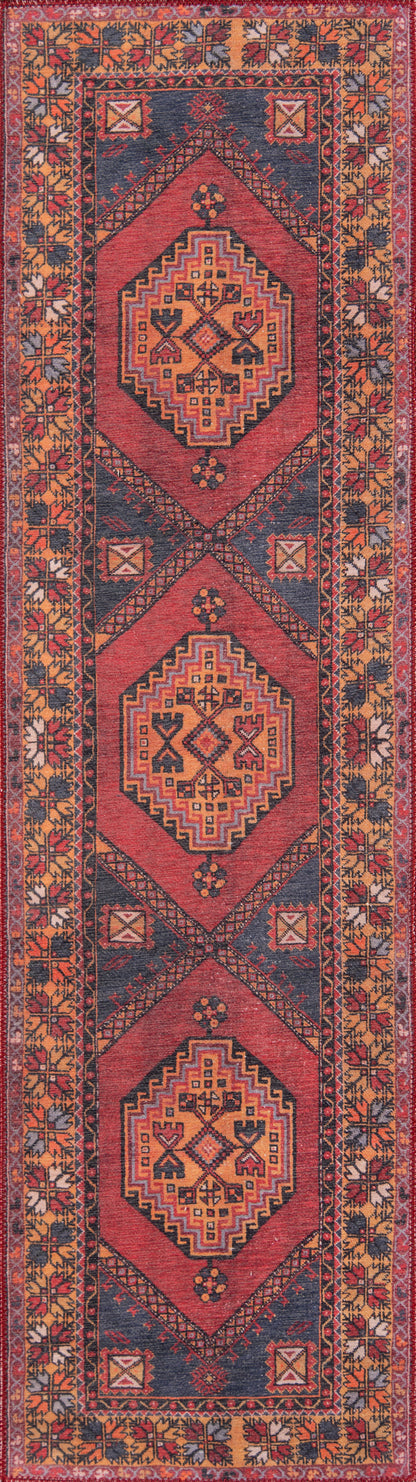Red oriental area rug with geometric diamond medallions, navy field and gold-orange border; decorative floor covering; 5' x 8'.