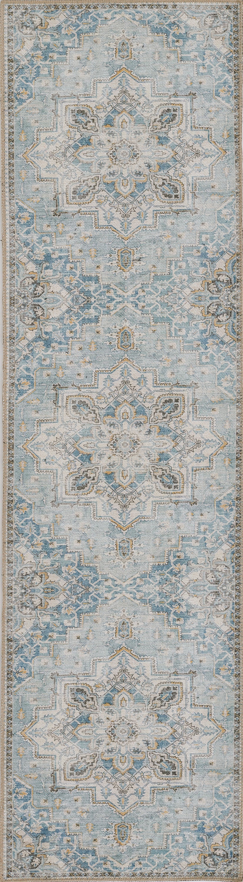 Long blue and ivory oriental-style runner rug with repeating medallion motifs and distressed vintage look.