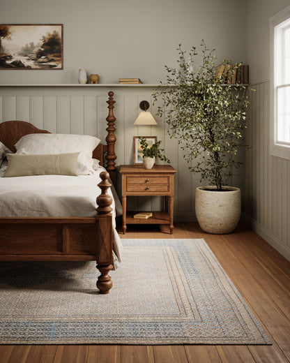 Beige-blue patterned rug runner on floor, 2' x 8'.