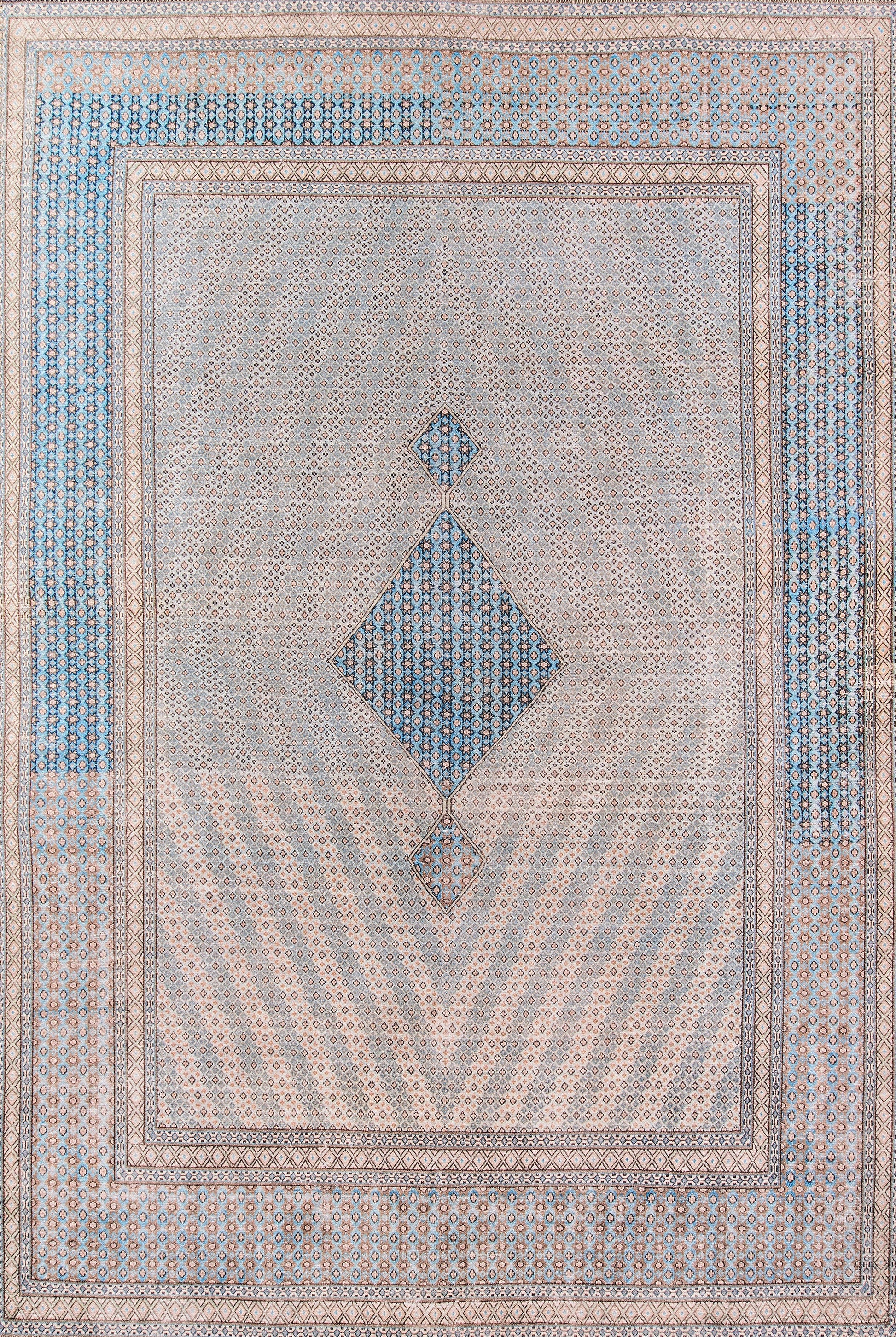 Rectangular beige rug with blue diamond medallions, tiny repeating motifs, and layered blue-tan borders.