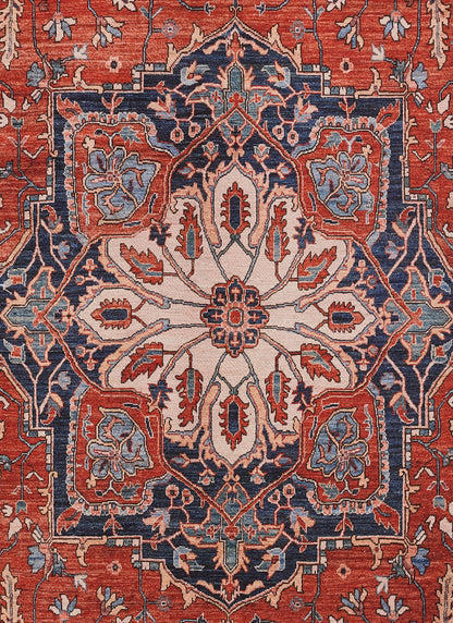 Rectangular Persian-style rug with red border, ivory central medallion, and blue accents; woven wool floor covering.