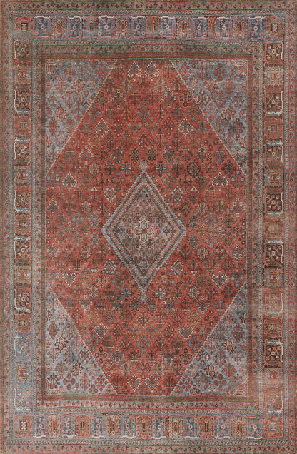 Persian-style distressed wool rug, red field with central diamond medallion, blue borders, intricate floral motifs.