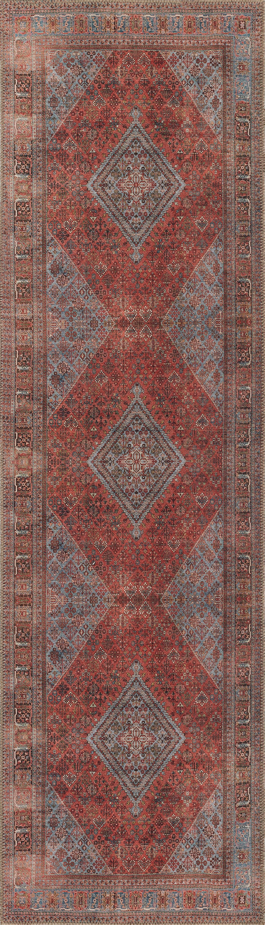 Persian-style rug with red diamond medallions on a blue-gray field, intricate borders and floral motifs.