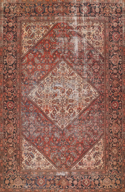 Distressed red Persian rug with ivory diamond medallion, intricate floral motifs, and ornate navy border.