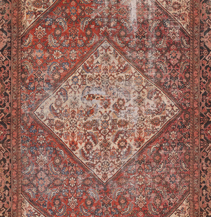 Red Persian rug featuring a pale ivory central diamond medallion with ornate blue and ivory floral borders.