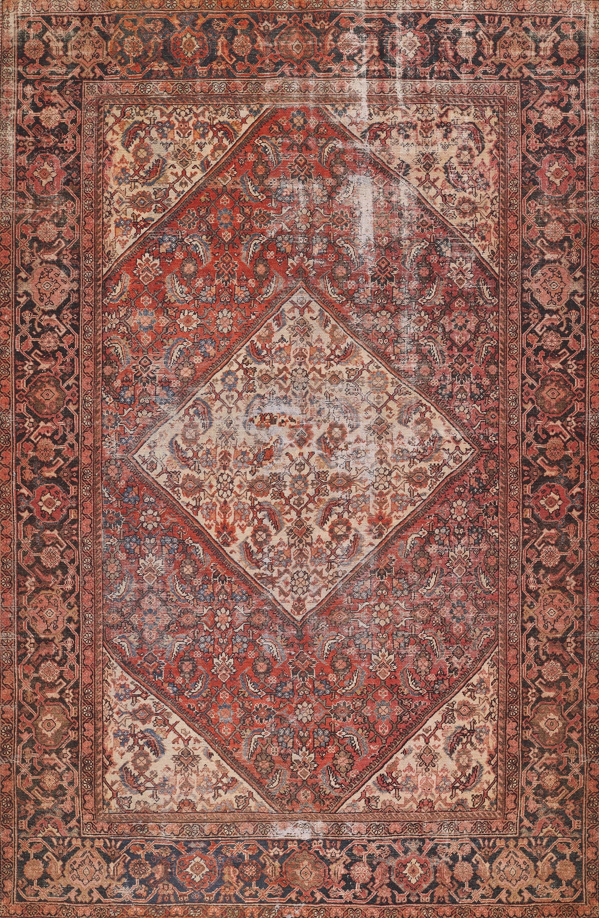 Persian-style rug with red and ivory tones; central diamond medallions on a red field, ornate floral border.