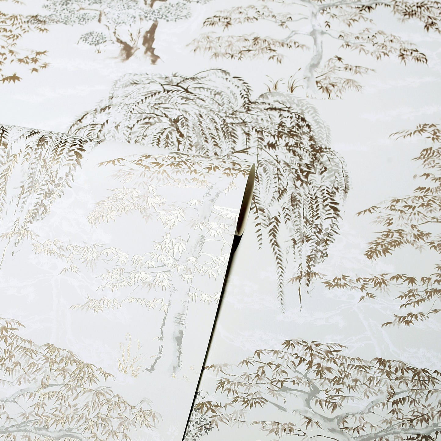 Close-up frosted glass panel with beige fern print and a diagonal seam between panes.