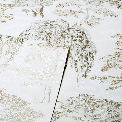 Close-up frosted glass panel with beige fern print and a diagonal seam between panes.