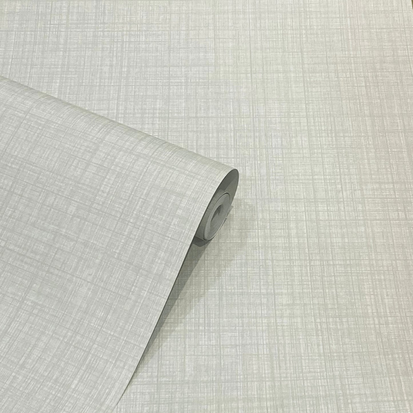 Roll of light gray wallpaper with subtle linen crosshatch texture, partially unrolled.