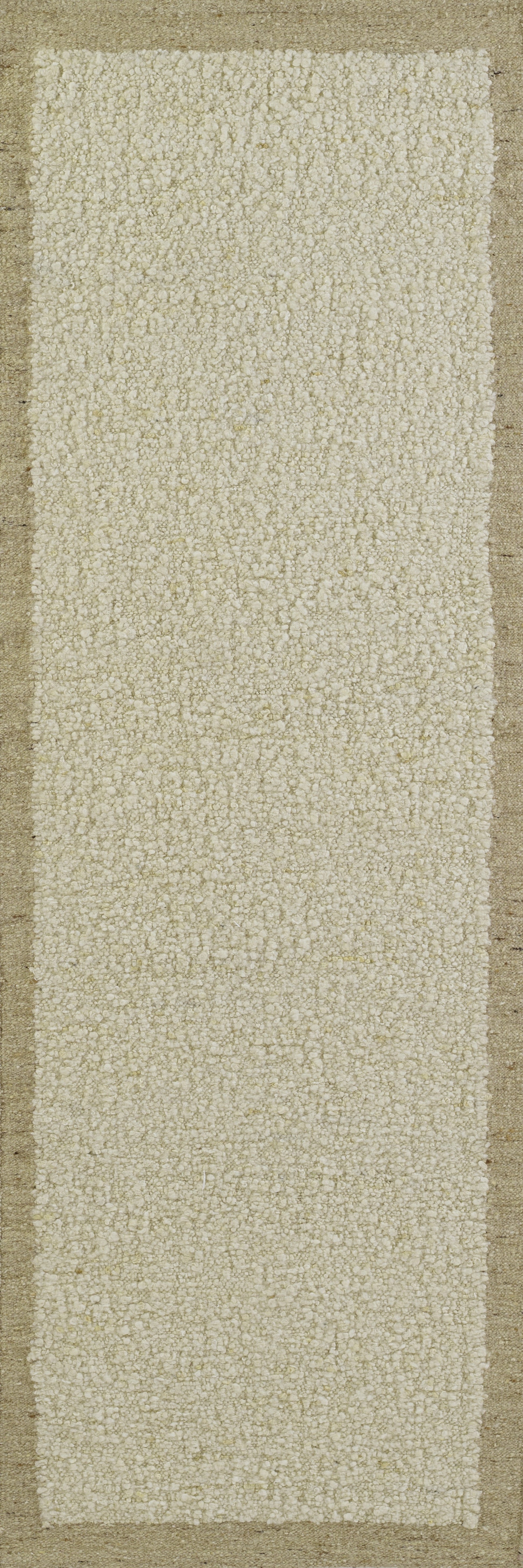 Beige textured rug with darker tan side borders; neutral modern hallway decor.