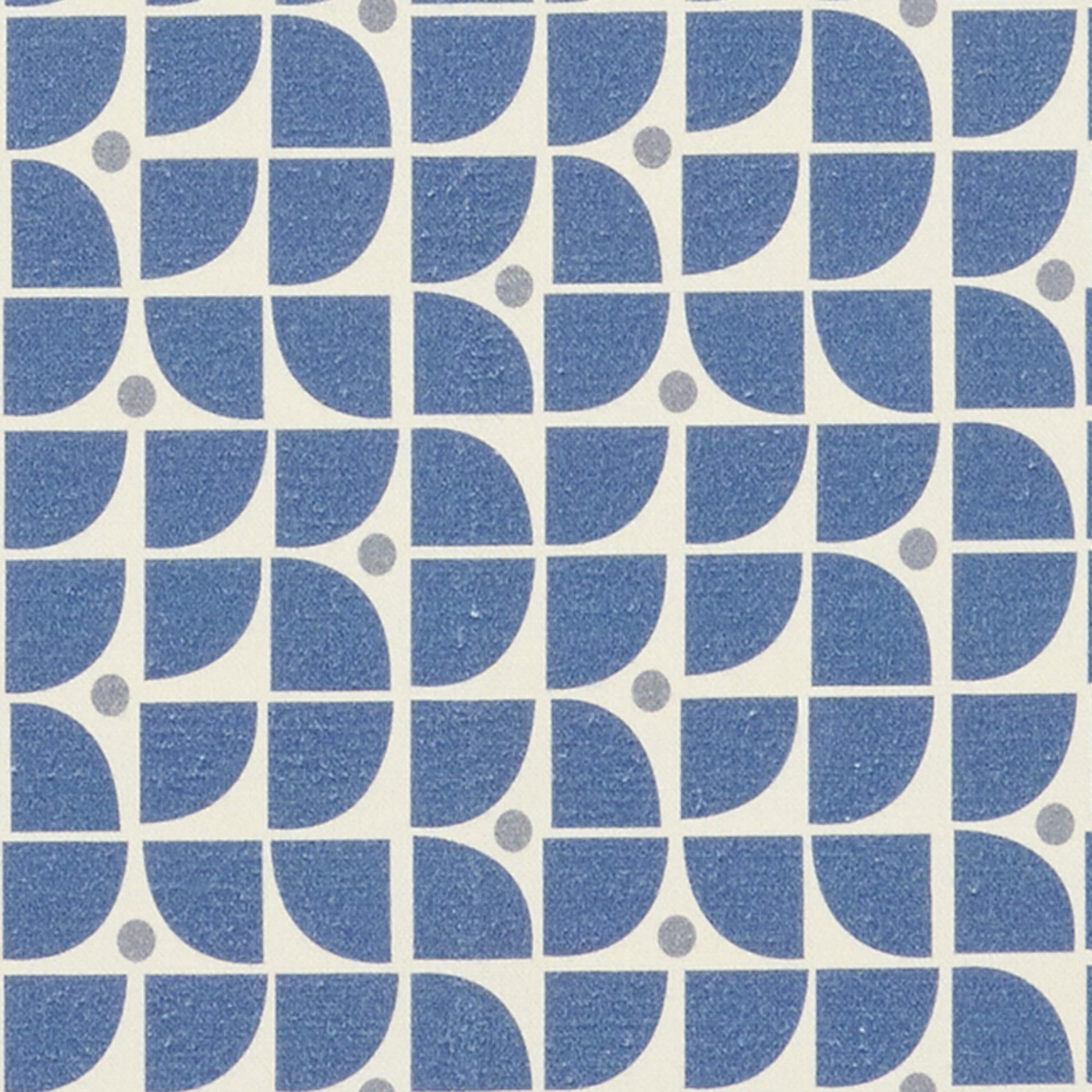 Blue & cream geometric fabric print with quarter-circle arcs forming circles and small gray dots.