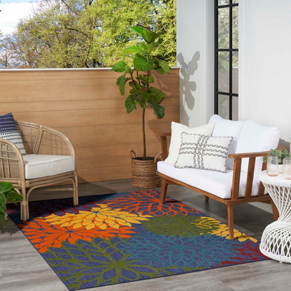 5x8 Navy Nourison Aloha area rug with multicolor pattern, durable indoor outdoor rug for living rooms, bedrooms, patios, and high-traffic spaces, versatile decorative rug for modern, coastal, or eclectic home décor.