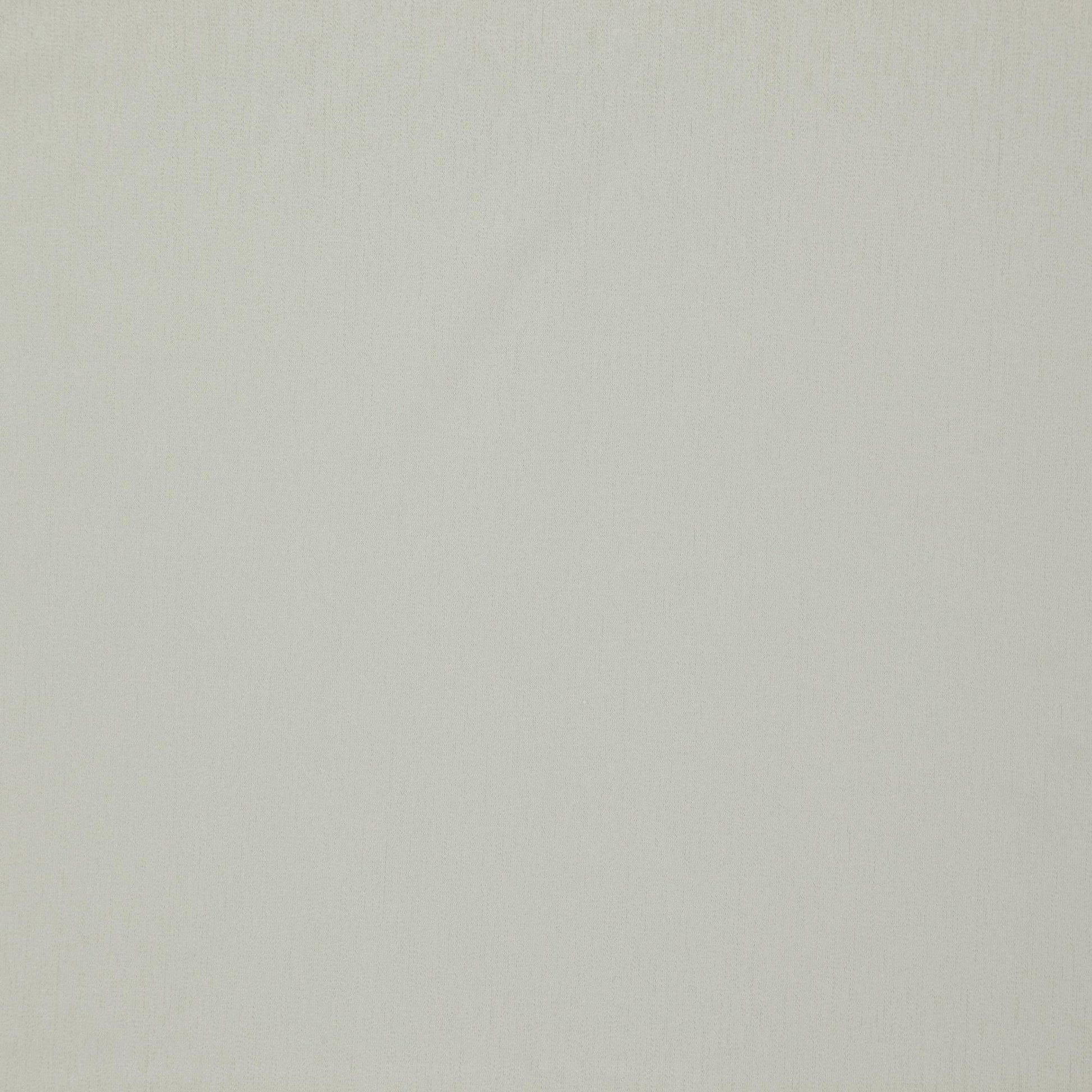 Light beige fabric texture with subtle weave; neutral background.