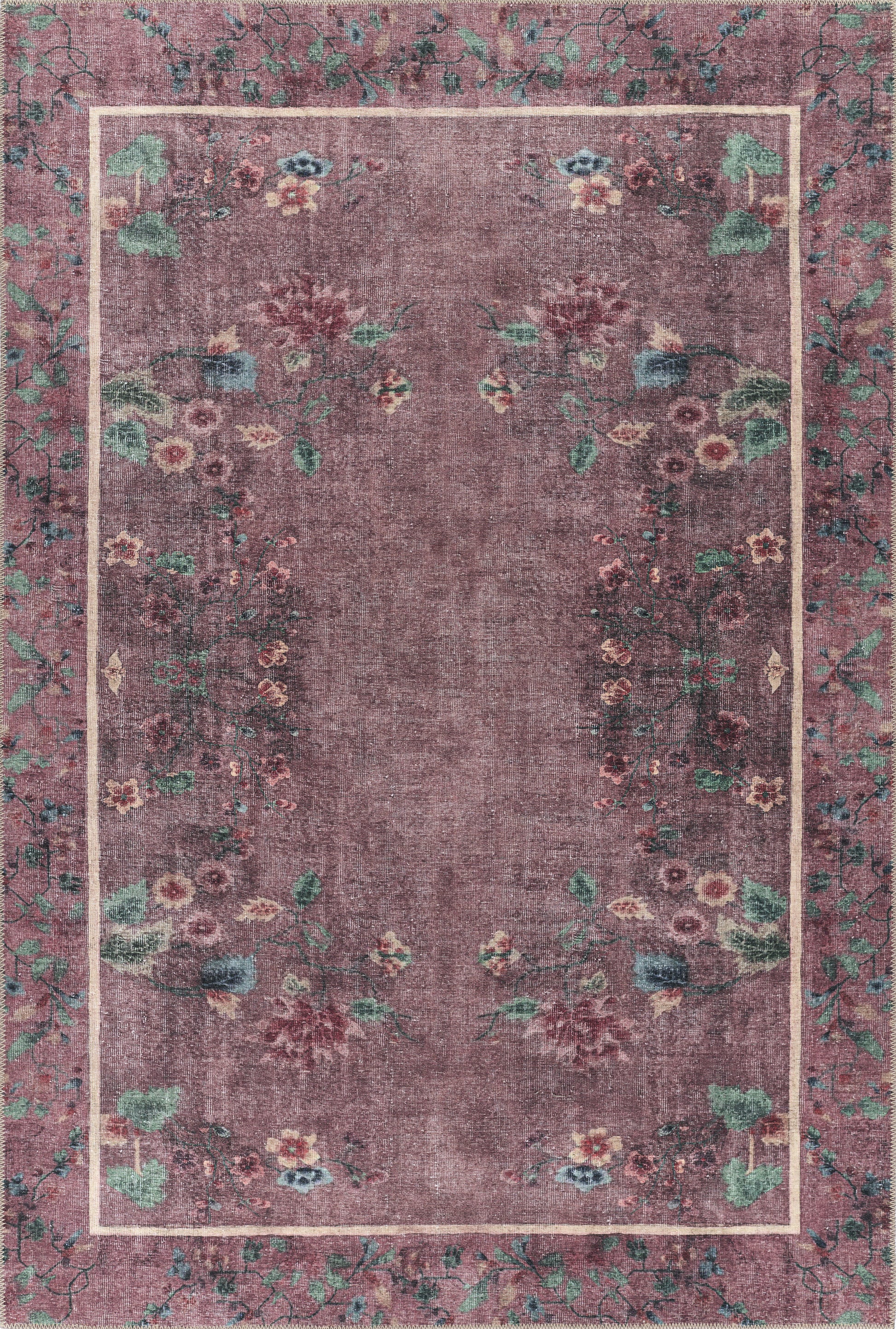 Purple floral area rug with a pale pink border and vine border, vintage distressed look; rectangular decorative rug.