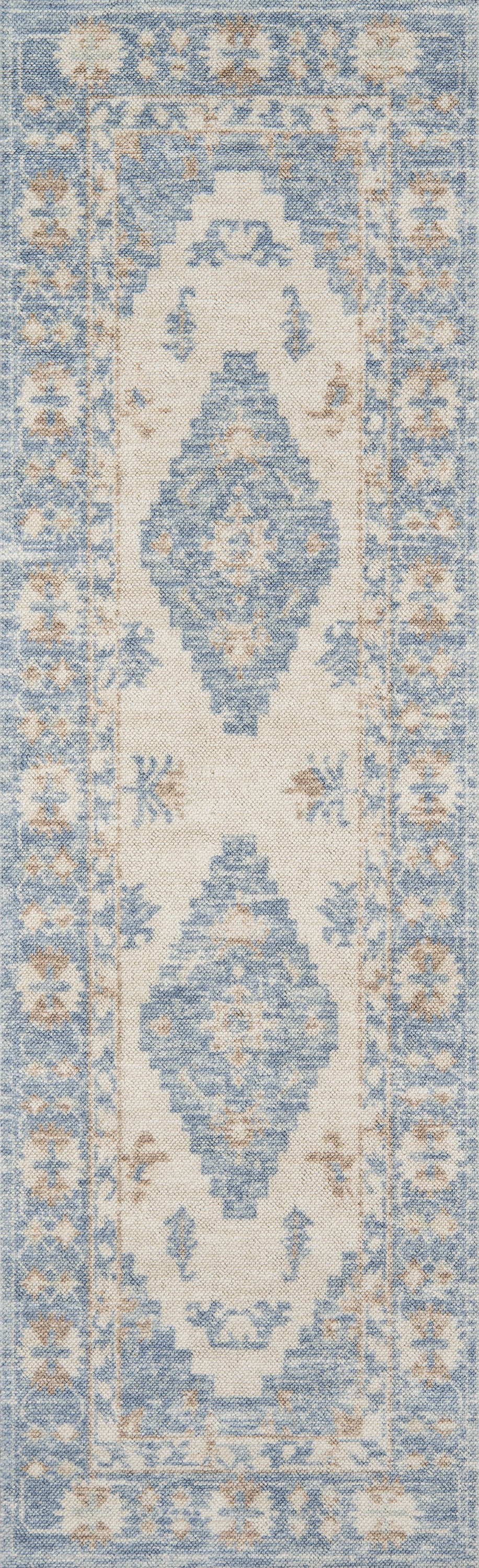 Rectangular blue and ivory rug runner with stacked diamond medallions and ornate border.
