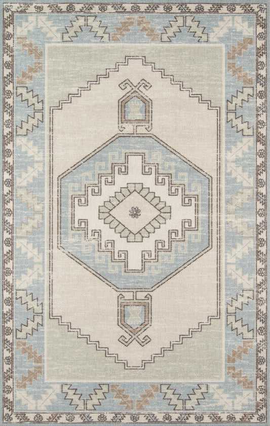 Anatolian-style area rug with pale beige field, light blue border, and octagonal central medallion with geometric motifs.