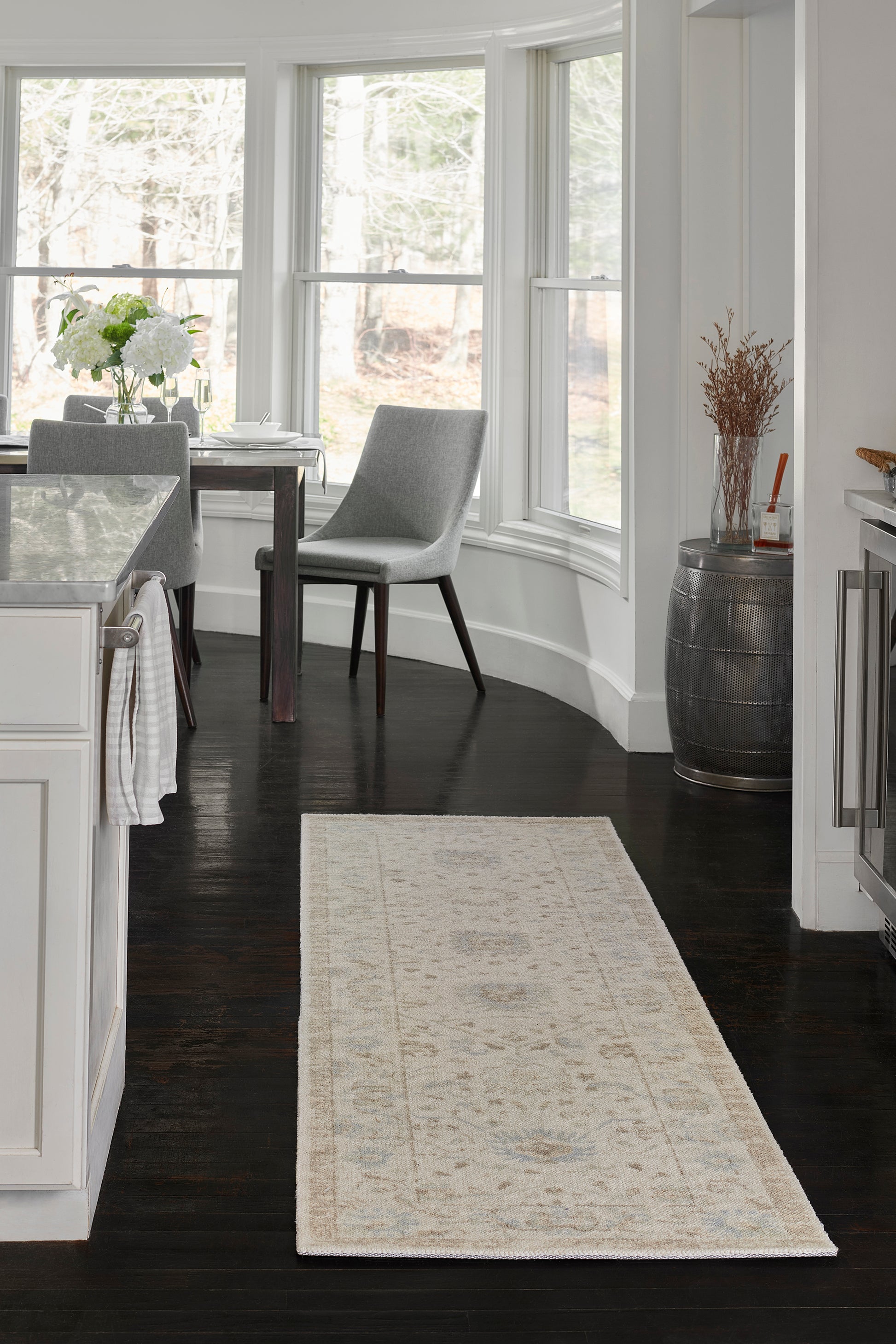 Beige ornamental runner rug with a subtle ivory pattern, long rectangular hallway rug.