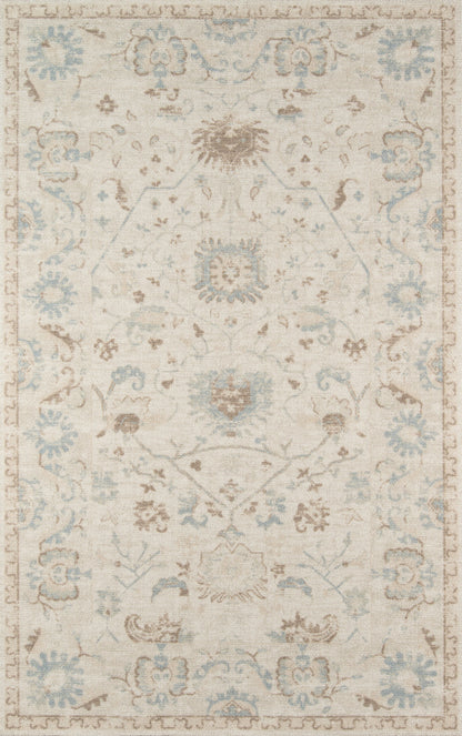 Ivory area rug with pale blue and taupe floral medallions and an ornate border in a vintage oriental style.