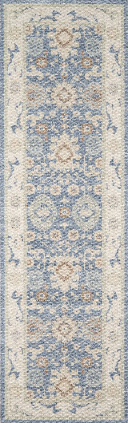 Rectangular area rug in blue and ivory with intricate floral and medallion motifs; traditional oriental design for hallways.