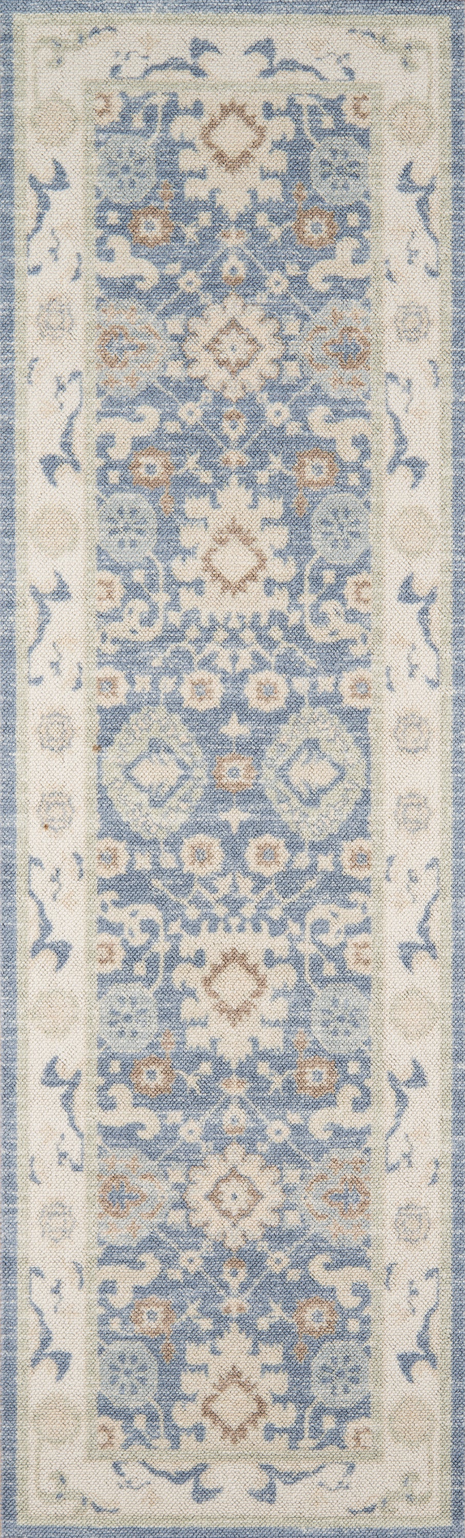 Rectangular oriental rug in blue and ivory with floral medallions and ivory border; size 5' x 8'; ideal hallway or doorway decor.