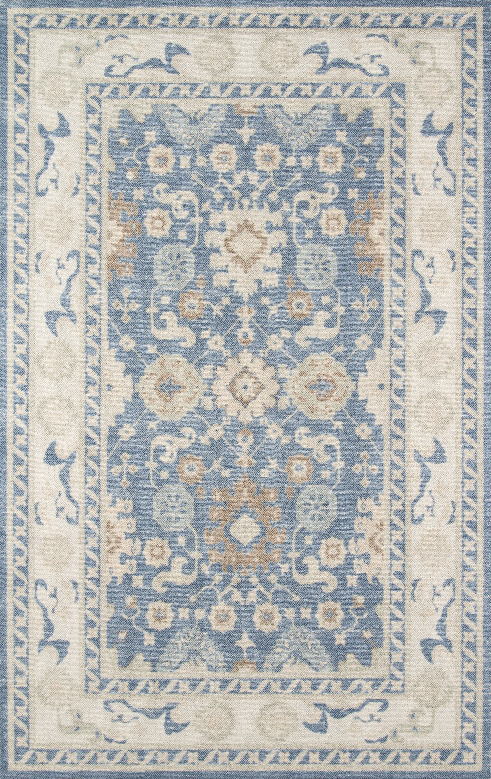 Anatolia-style blue and ivory area rug with ornate floral medallions and scrolling border.