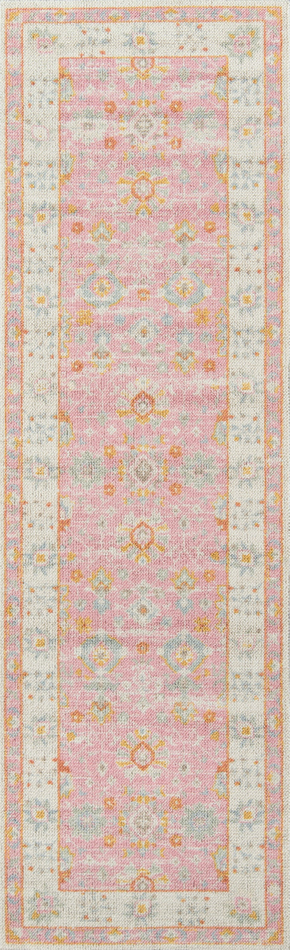 Pink Anatolian runner rug with pastel floral motifs & cream border.