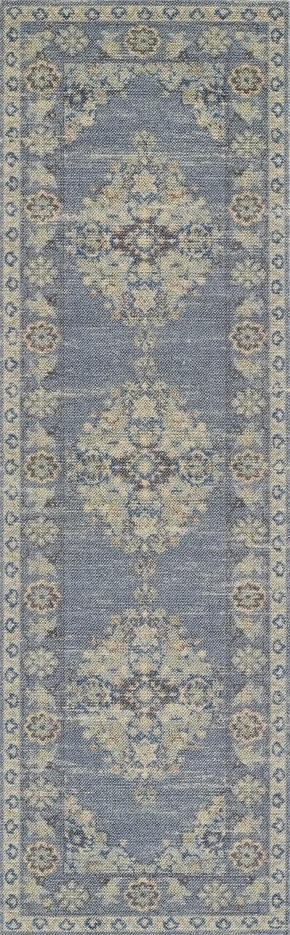 Blue oriental runner rug with ivory floral medallions and decorative border.