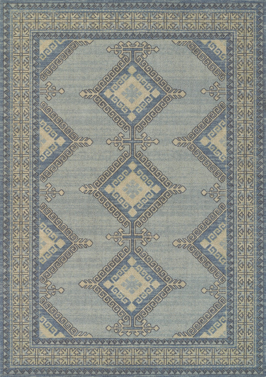 Blue-toned woven area rug with geometric diamond medallions and Greek-key border for living room decor.
