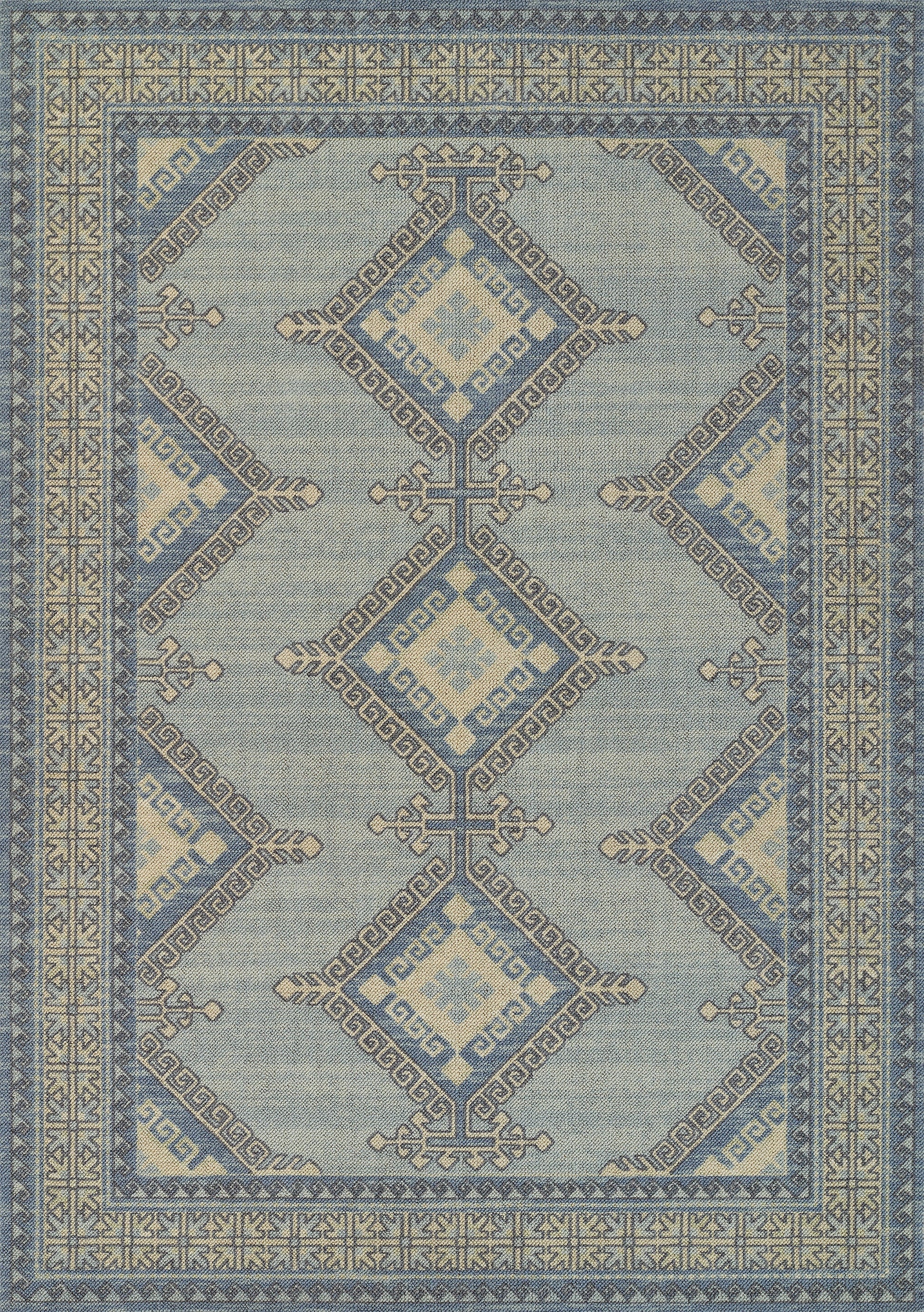 Blue and cream geometric oriental rug with diamond medallions and Greek-key borders, decorative living room floor cover.