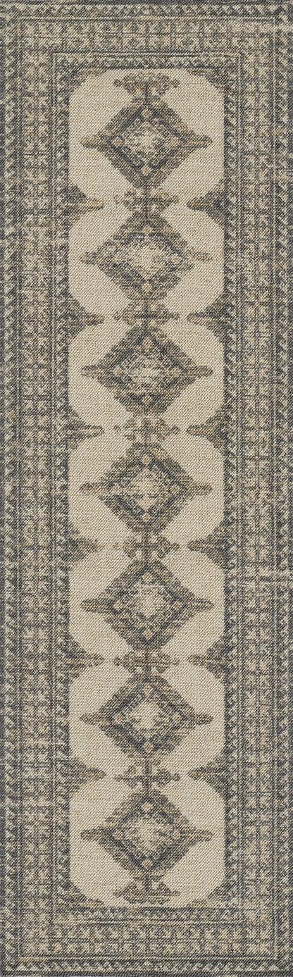 Cream rug with blue-gray diamond medallions in a vertical row, framed by narrow geometric borders.