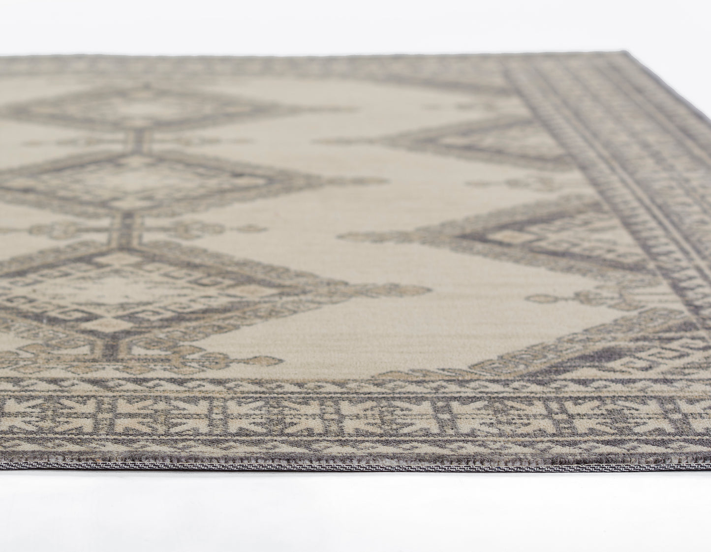 Beige flat-weave rug with gray geometric diamond pattern and decorative border.