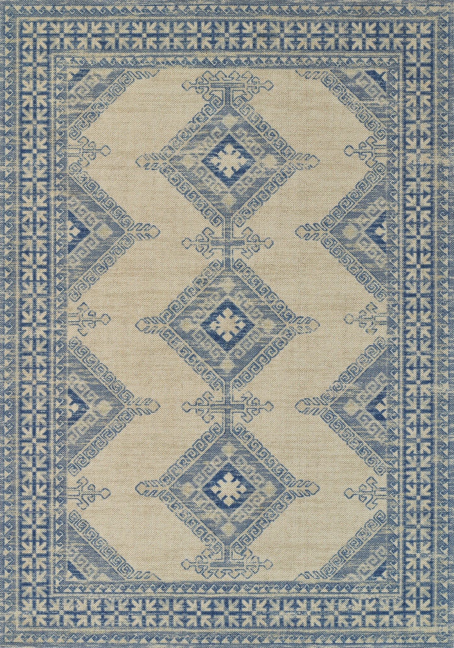 Blue and ivory woven oriental-style rectangle rug with diamond medallions and ornate border.
