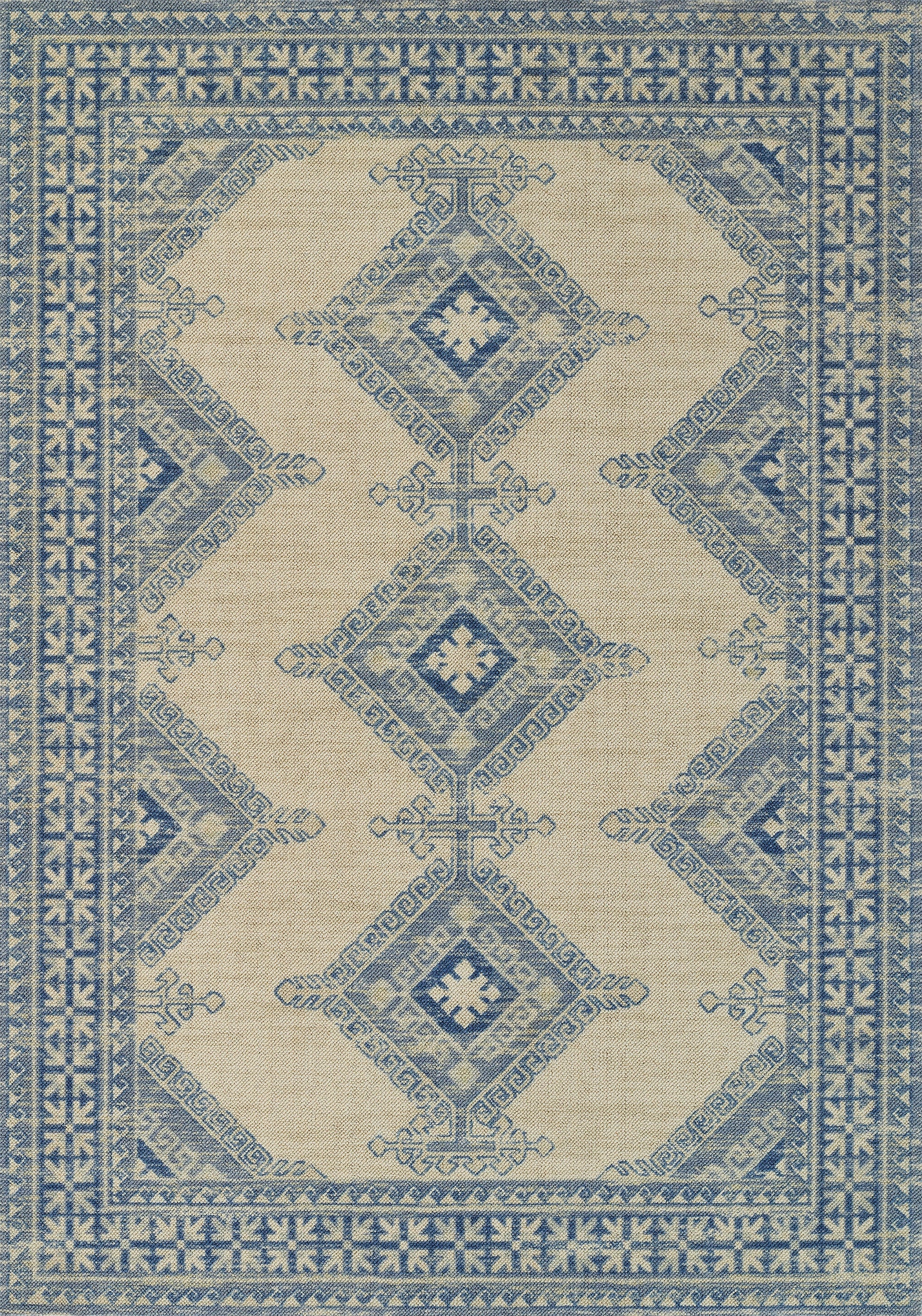 Blue and ivory woven oriental-style rectangle rug with diamond medallions and ornate border.