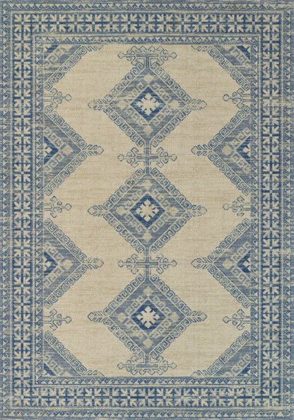 Blue and ivory patterned area rug with diamond medallions and geometric border, vintage oriental-inspired design.