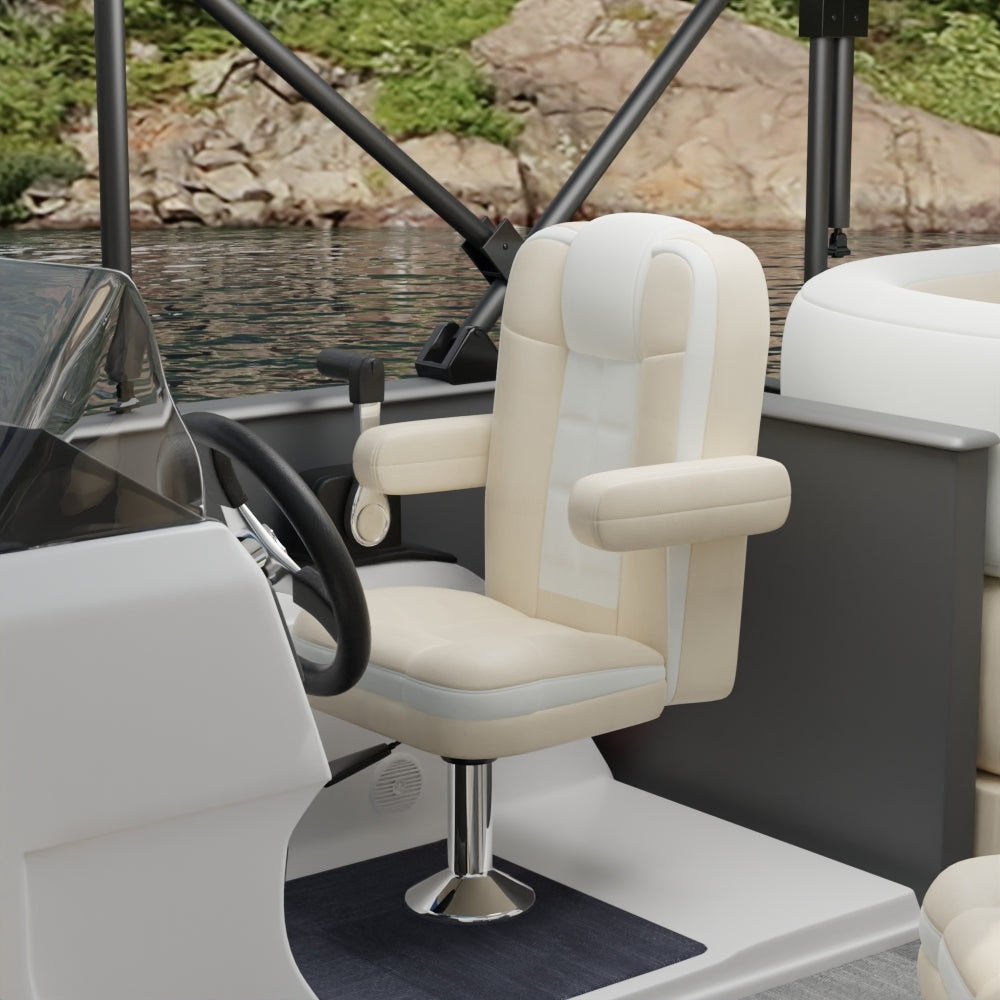 Ivory solid fabric captain chair with padded armrests on a chrome pedestal in a boat cockpit; steering wheel and water view.