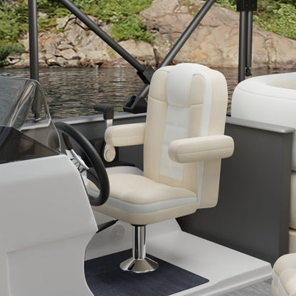 Ivory solid fabric captain chair with padded armrests on a chrome pedestal in a boat cockpit; steering wheel and water view.