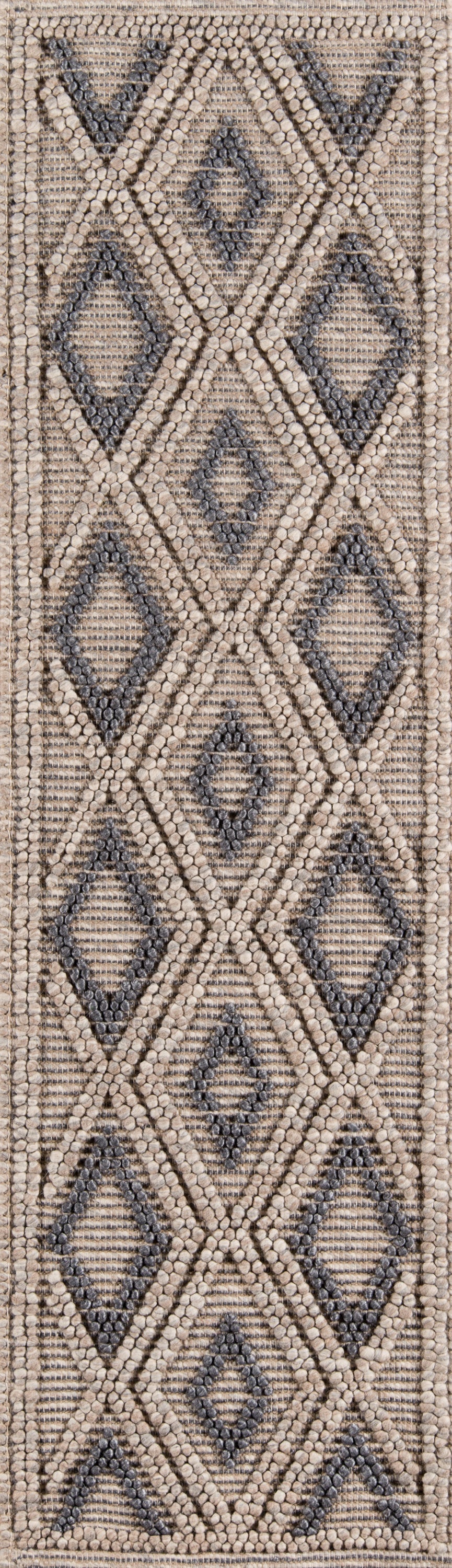 Narrow flat-weave rug in beige with blue diamond geometric pattern; kilim-inspired floor runner.