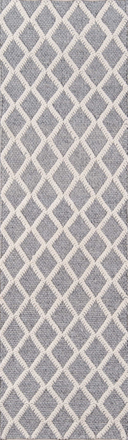 Gray woven rug with a white diamond lattice trellis pattern.
