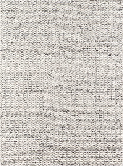 Light ivory-gray speckled woven rug with subtle texture; flat-weave style, neutral floor decor.