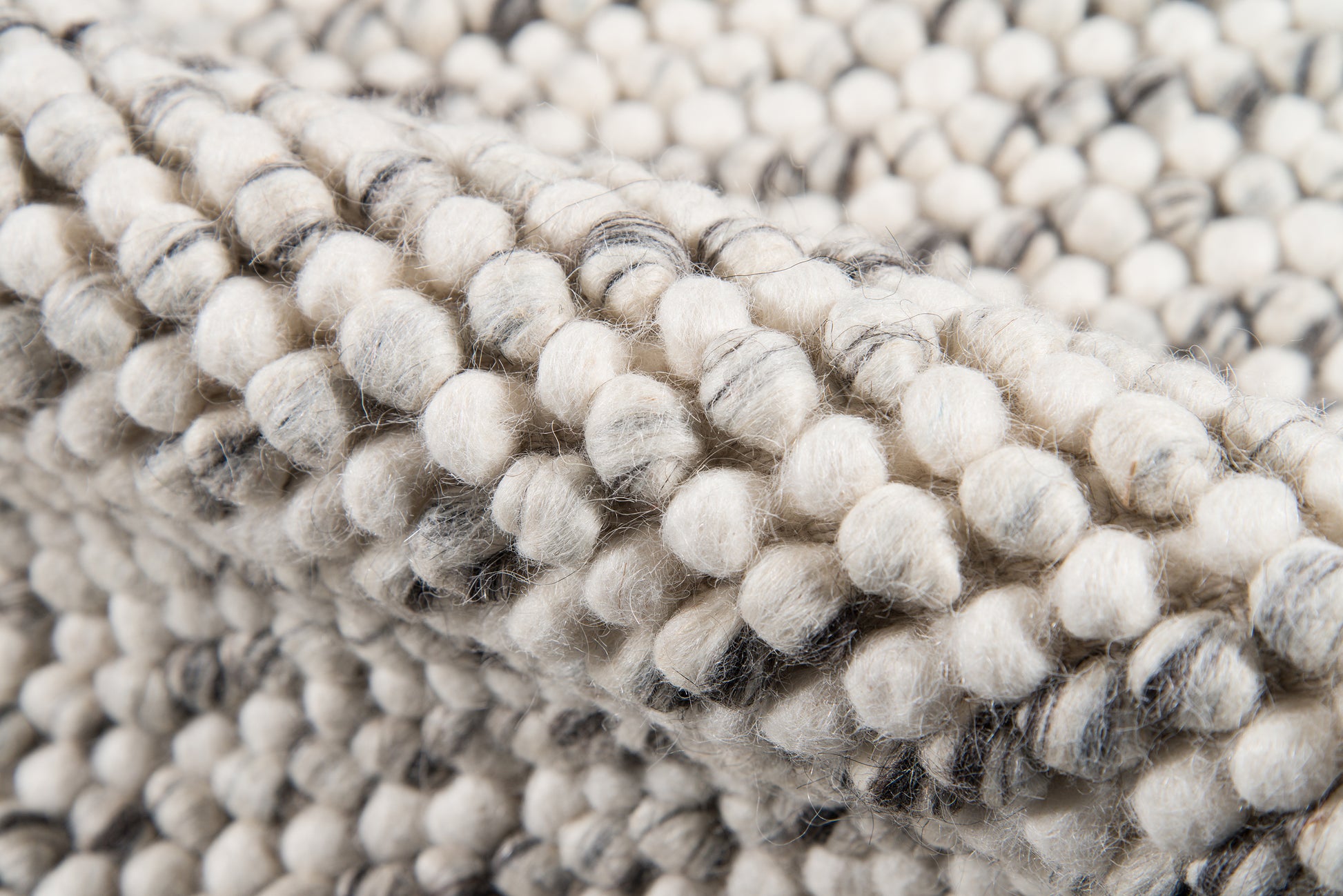 Ivory-gray looped pom-pom chenille texture; chunky woven fringe, cozy soft throw.