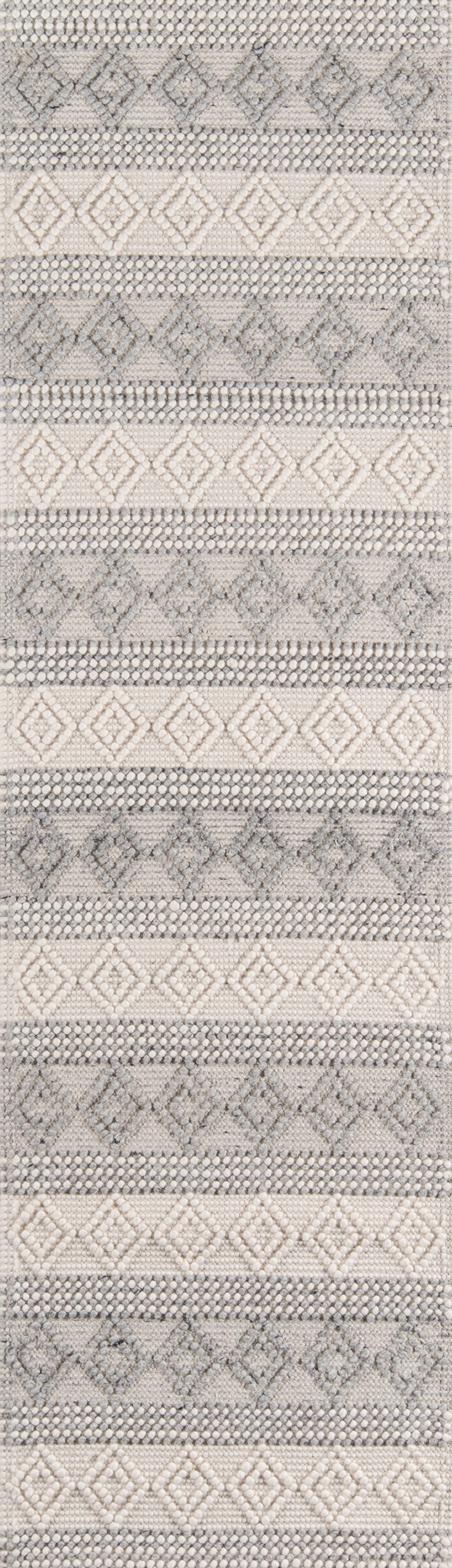 Ivory woven rug with gray diamond motifs in horizontal bands; size 9' x 12'.