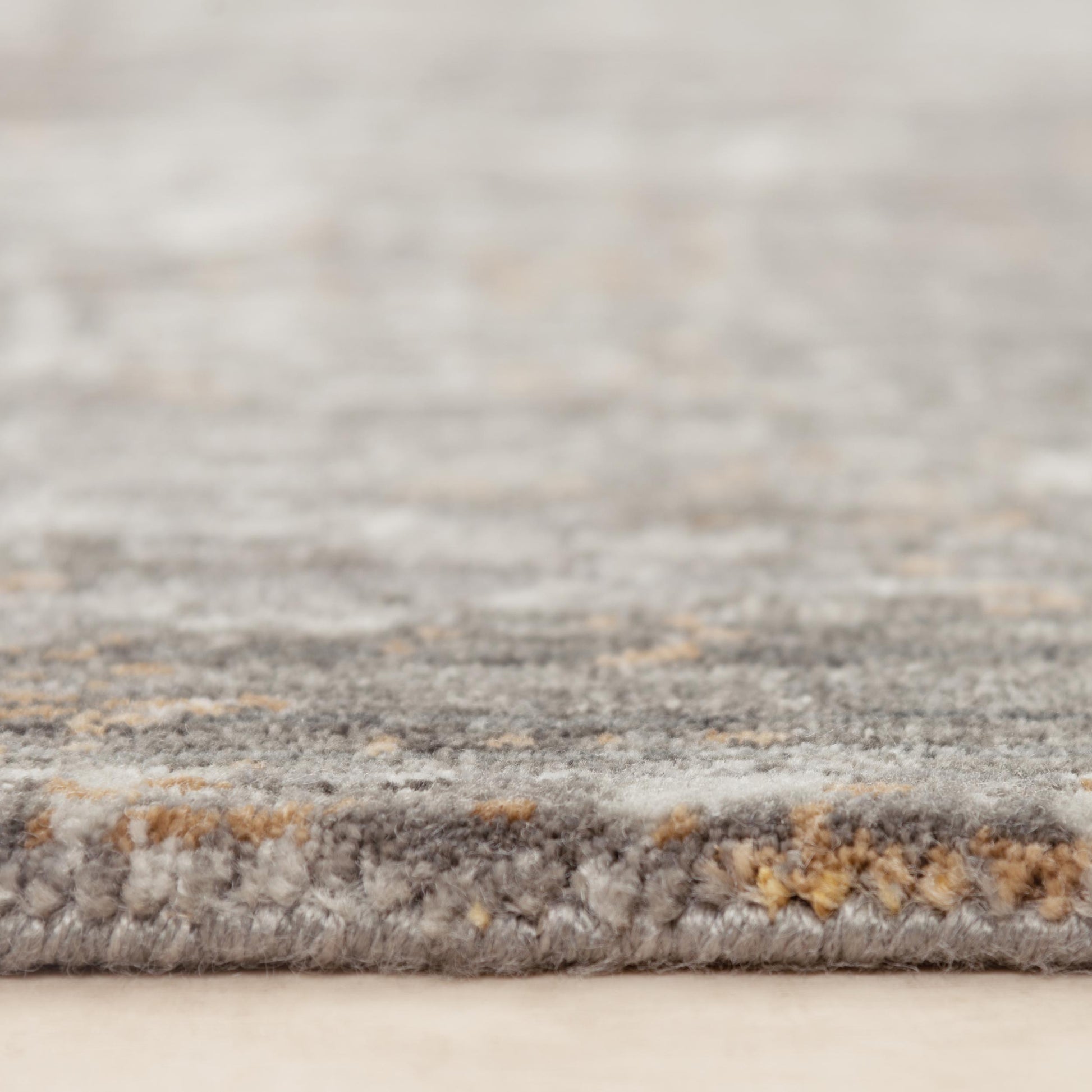 Contemporary rug, 9' x 12', laid flat on the floor.